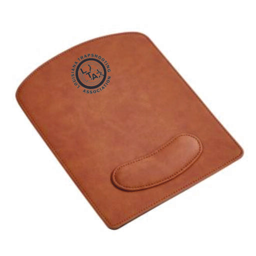 The Prize Possessions Caramel Leatherette Mouse Pad features a built-in wrist rest and the Indian Trapshooting Association’s circular logo in the upper left corner, offering a stylish leather-style desk accessory for smooth cursor control.