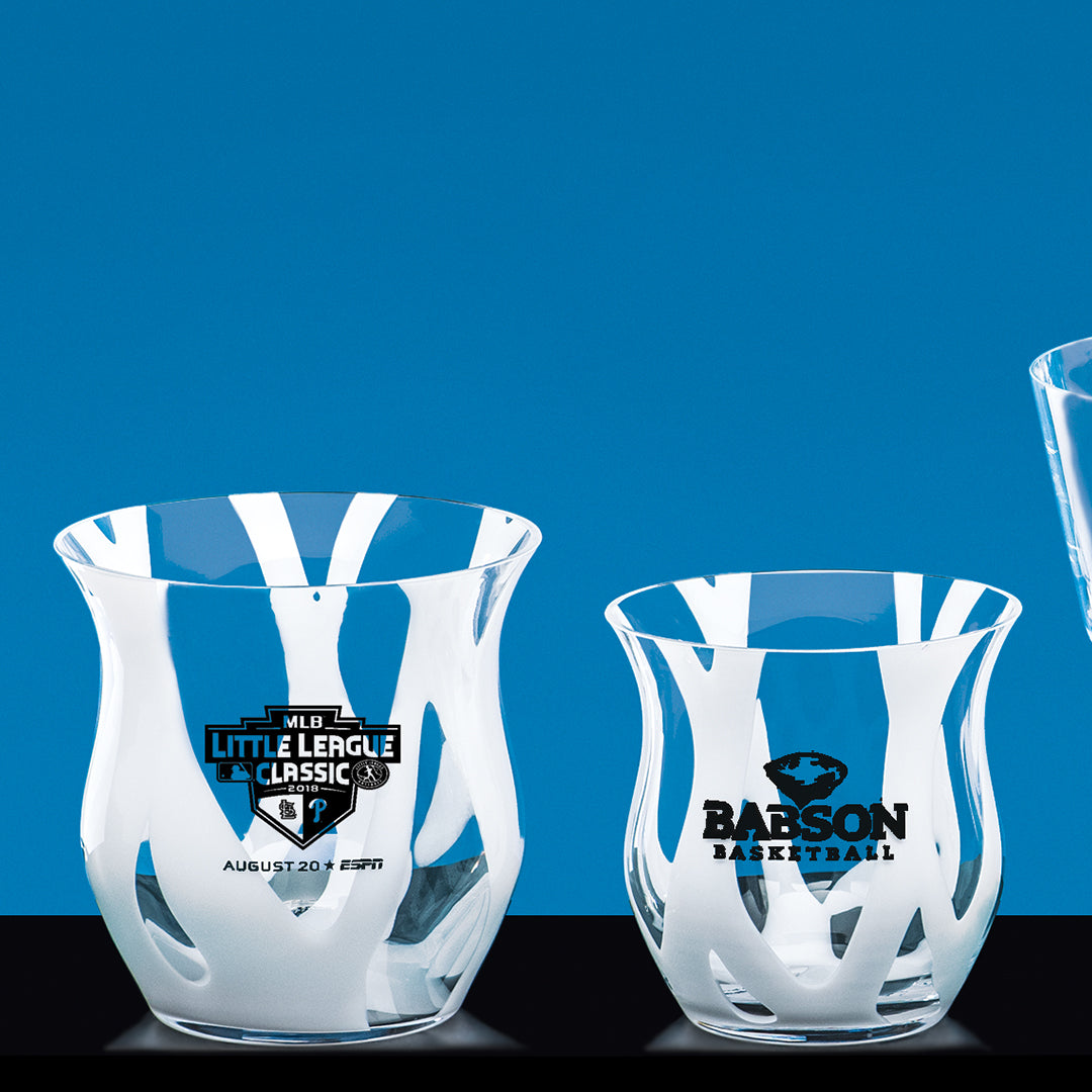 Two Prize Possessions Clear Bowls with White Waves, left featuring the MLB Little League Classic logo and date, right showing the Babson Basketball beaver; both set against a blue background.