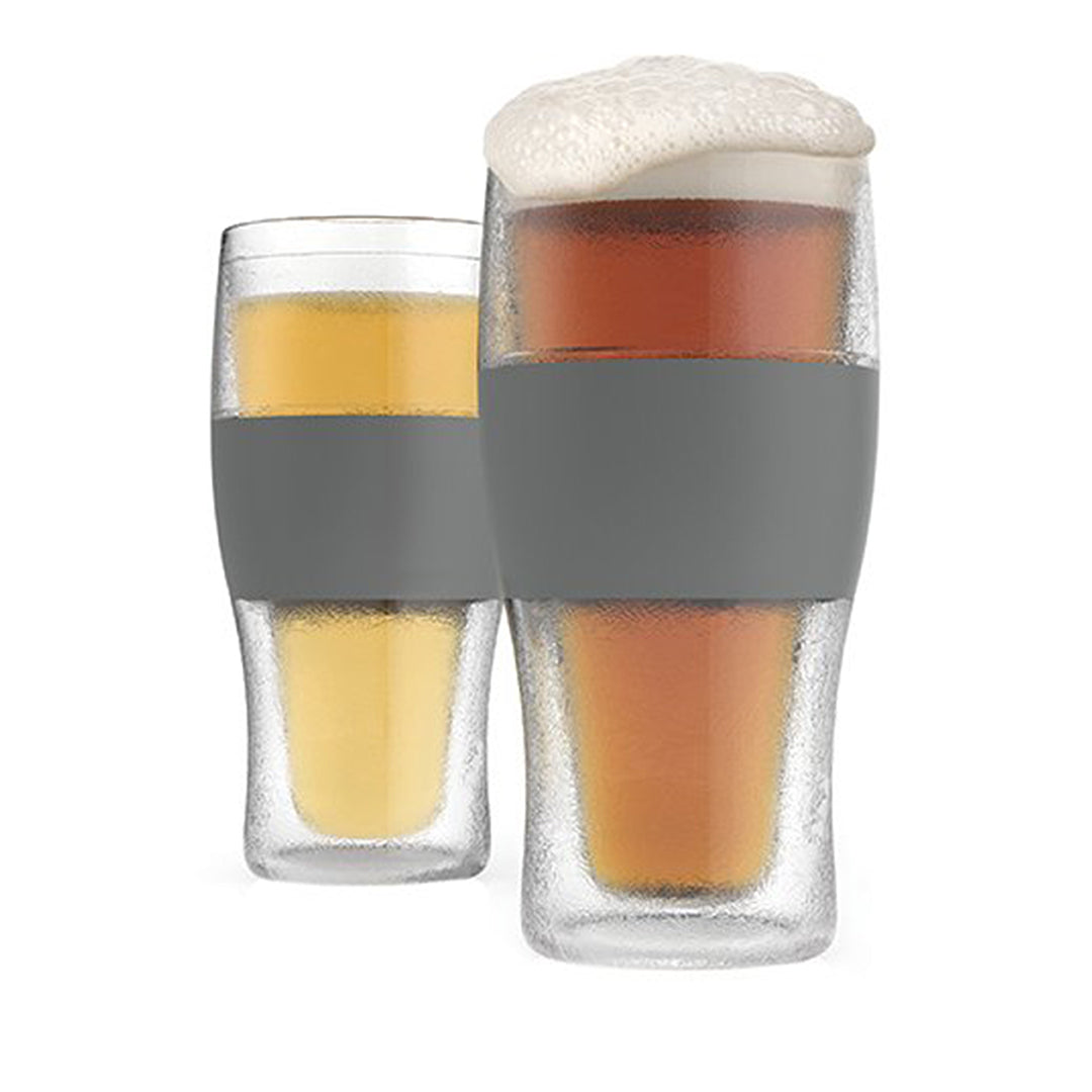 The Prize Possessions Cooling Freeze Pint Glass features a gray silicone grip and keeps drinks icy cold—perfect for light or dark beer with a foamy head. Condensation forms on the glass, making it the ultimate frozen drink accessory.