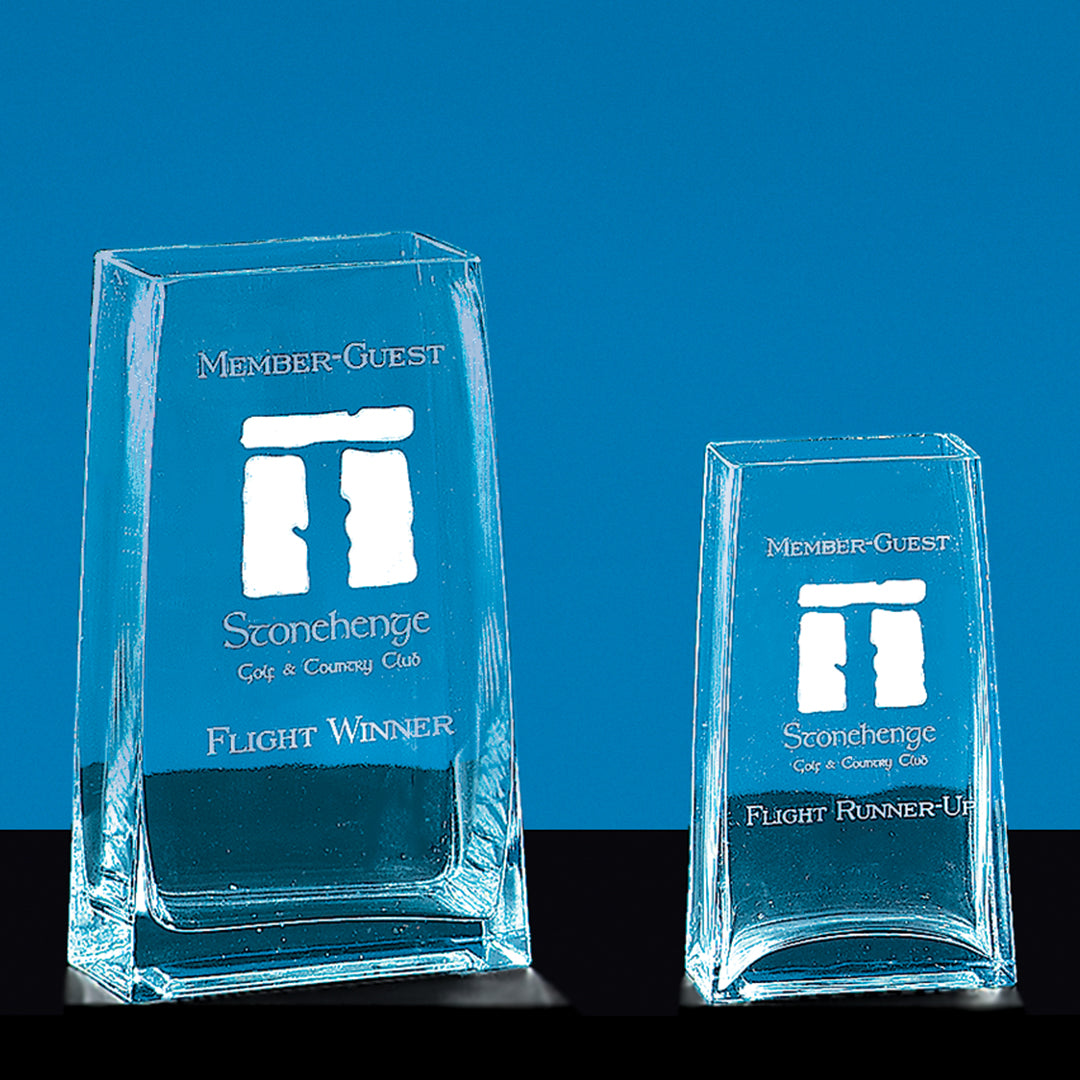 Two clear Crystal Burgess Vases by Prize Possessions feature etched text and the Stonehenge logo. The larger reads “Flight Winner,” the smaller “Flight Runner-Up.” Both make striking accents for any Member-Guest Stonehenge Golf & Country Club display.