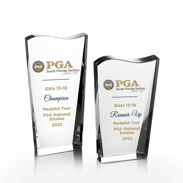 Two Prize Possessions Crystal Facet Wave awards with gold and black PGA South Florida Section logos: left reads Girls 13-18 Champion, right Boys 13-18 Runner-Up. Both honor Medalist Tour PGA National Estates 2022—a true celebration of achievement.