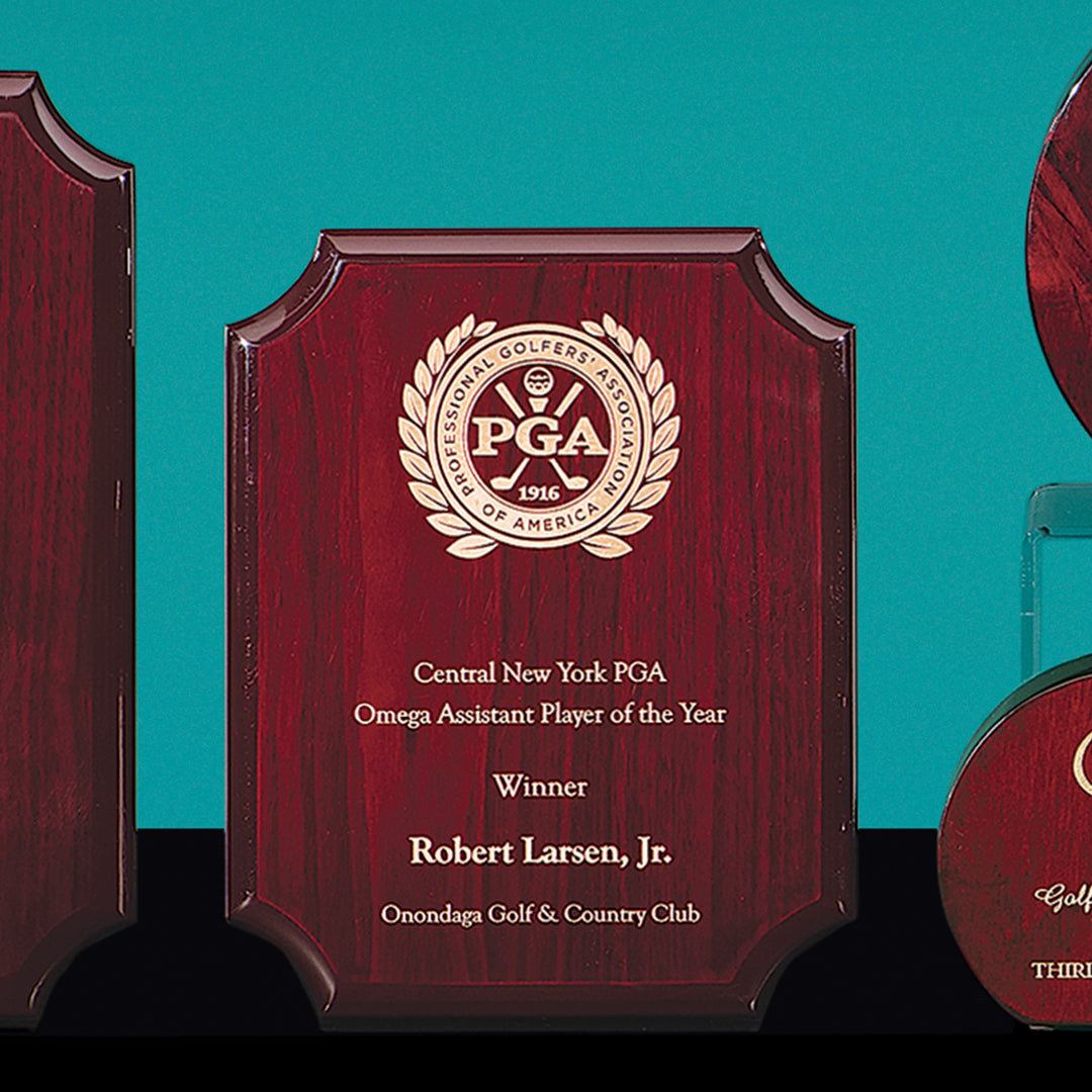 The Notched Rosewood Plaque by Prize Possessions features an elegant design—ideal for employee awards, such as honoring Robert Larsen, Jr. as Central New York PGA Omega Assistant Player of the Year from Onondaga Golf & Country Club.