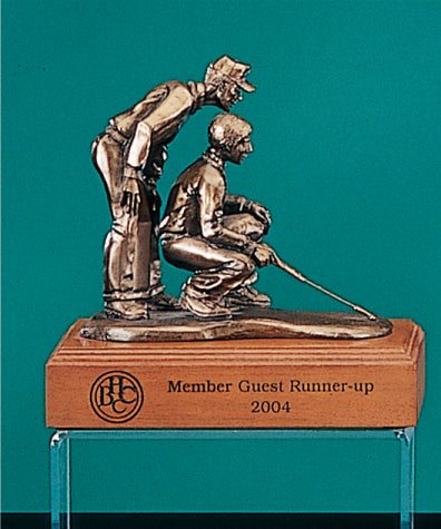 The Partners I Statue by Prize Possessions features two bronze golfers on a wooden base labeled "Member Guest Runner-up 2004" with a round logo—perfect for employee recognition or as a unique corporate award.