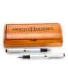A Prize Possessions Pen/Pencil Set features a wooden case with a professional look and two silver pens with black accents, arranged in front of the case on a white background.