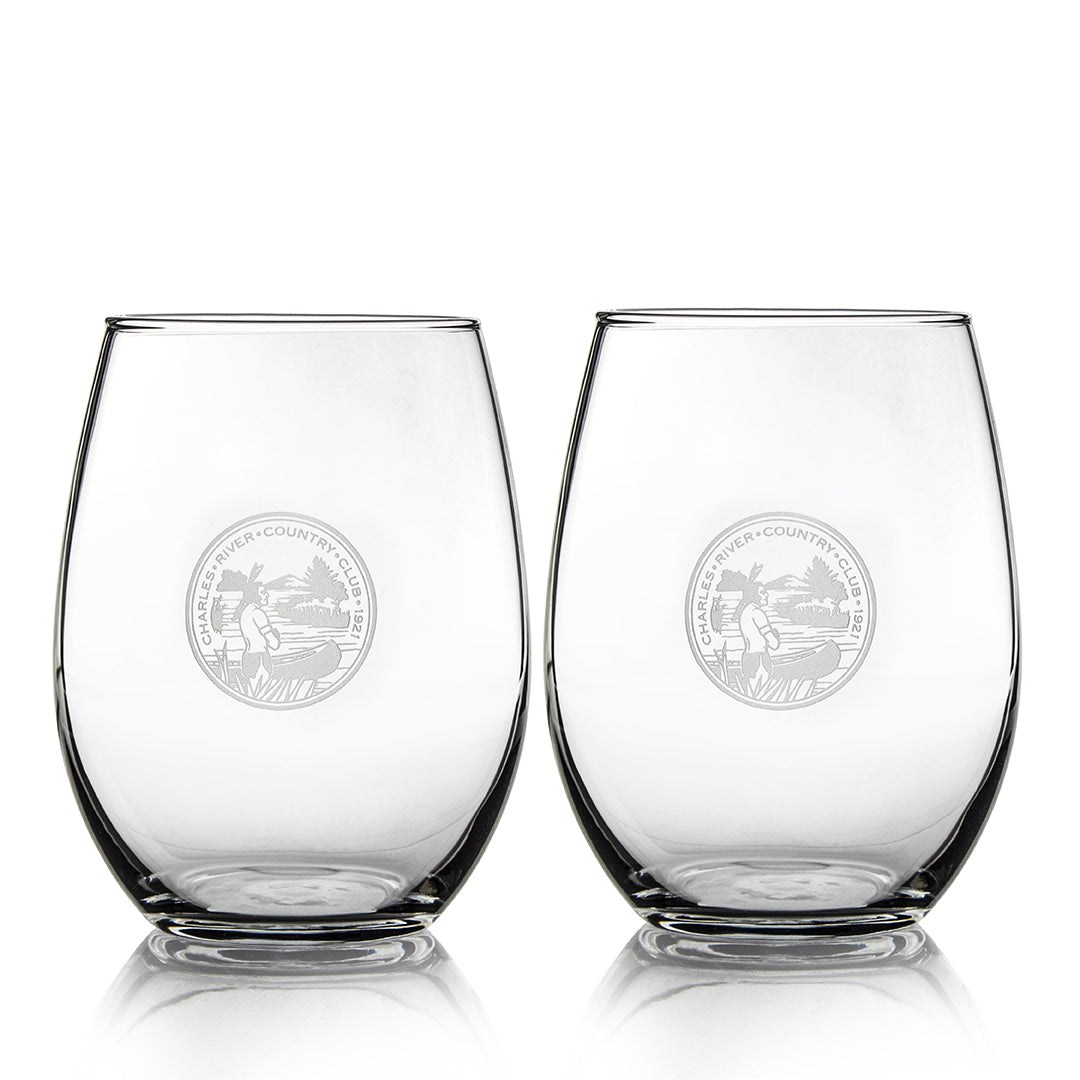 The Prize Possessions Stemless Wine Gift Set (2 ea. 2054) includes two clear stemless glasses etched with a circular logo featuring text, a river, trees, and grass—an elegant hostess gift displayed side by side on a white background.