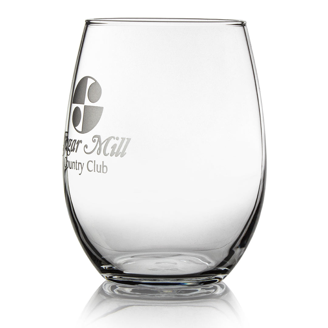 The Prize Possessions Stemless Wine Glass, featuring an etched Sugar Mill Country Club logo and text, is photographed on a white background—the ideal wine accessory for casual dinners.
